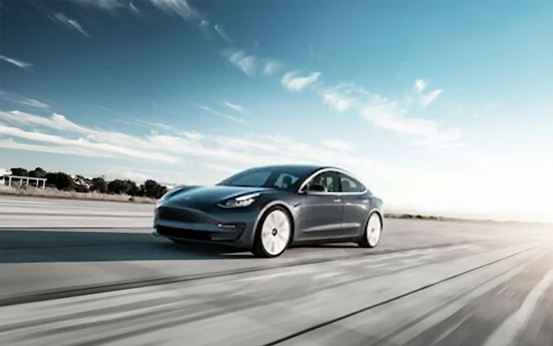 Automobiles and accessories image showing a car with various car parts and accessories displayed nearby