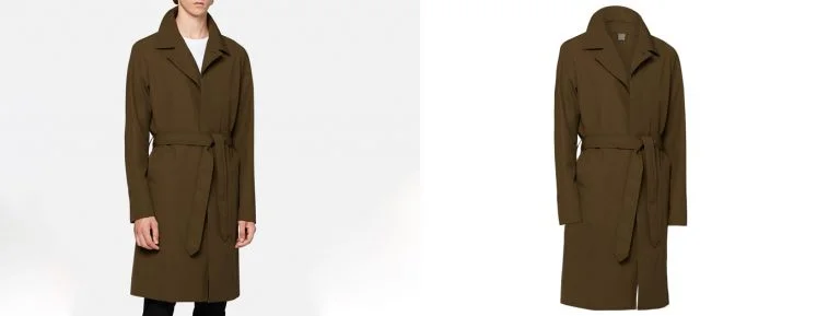 Tailor expertly sewing the neck joint of a garment with precision.